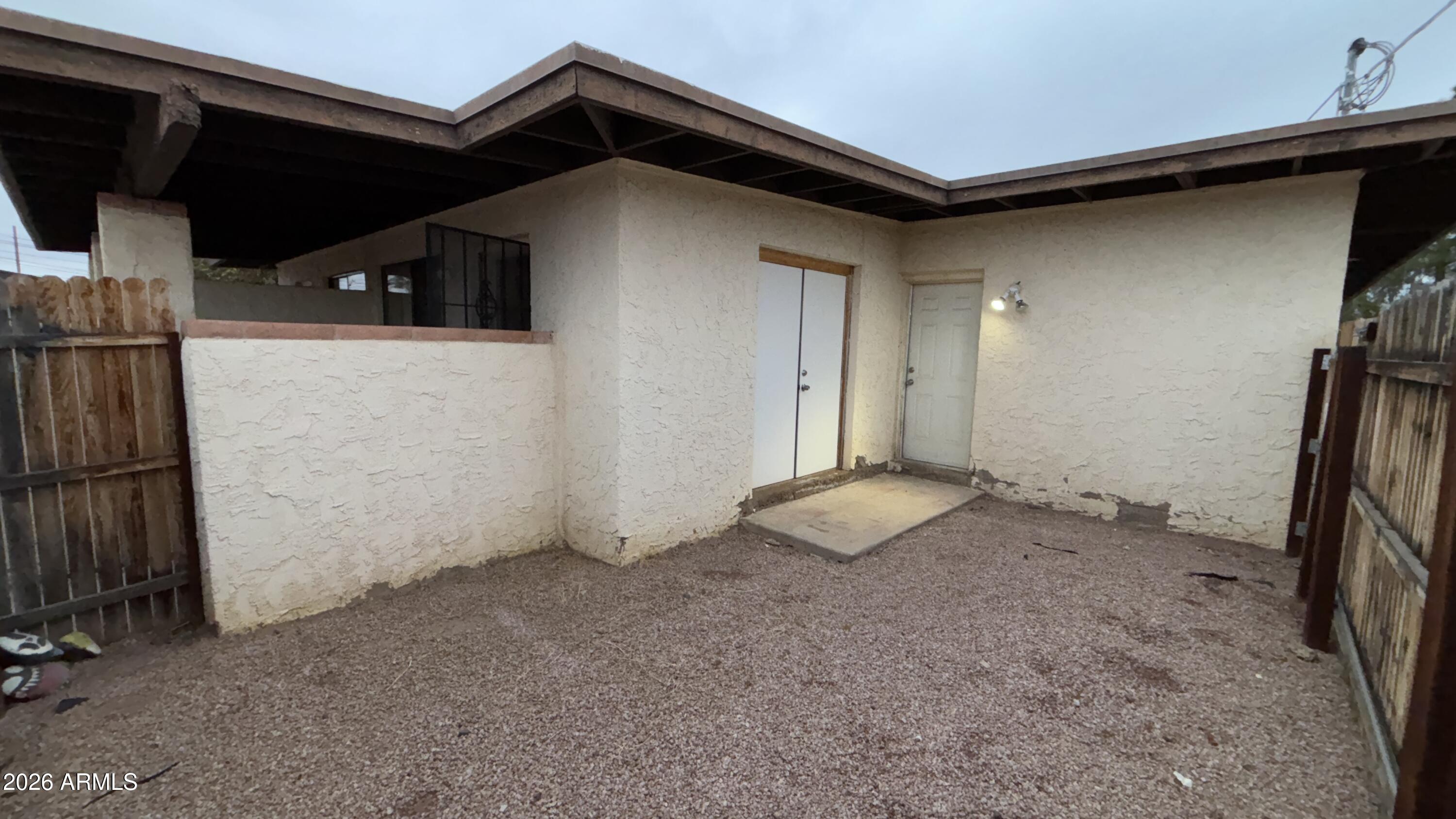 1301 West 3rd Street, Unit 3 Tempe, AZ 85281 - Photo 12 of 16 a view of a house with a garage