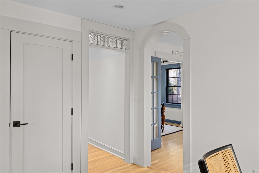 348 Main Street Norwell, MA 02061 - Photo 11 of 42 a view of a hallway with wooden floor and entryway