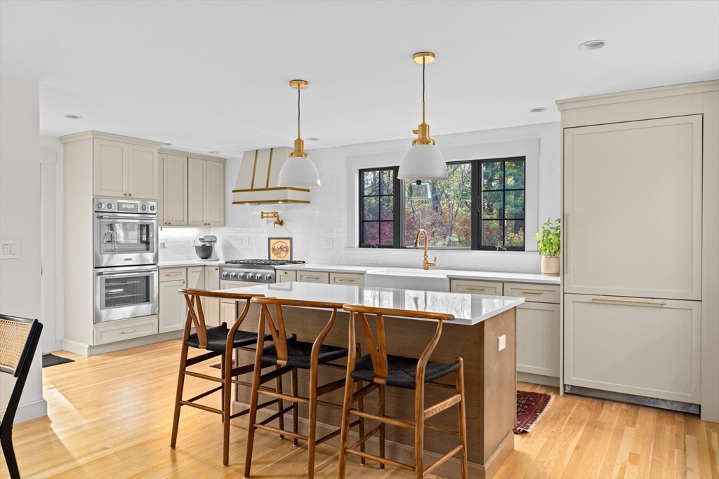 348 Main Street Norwell, MA 02061 - Photo 2 of 42 a dining table with chairs and wooden floor
