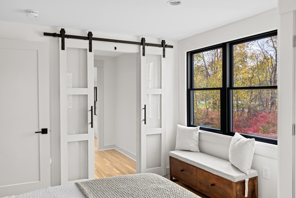 348 Main Street Norwell, MA 02061 - Photo 21 of 42 a living room with furniture and a window