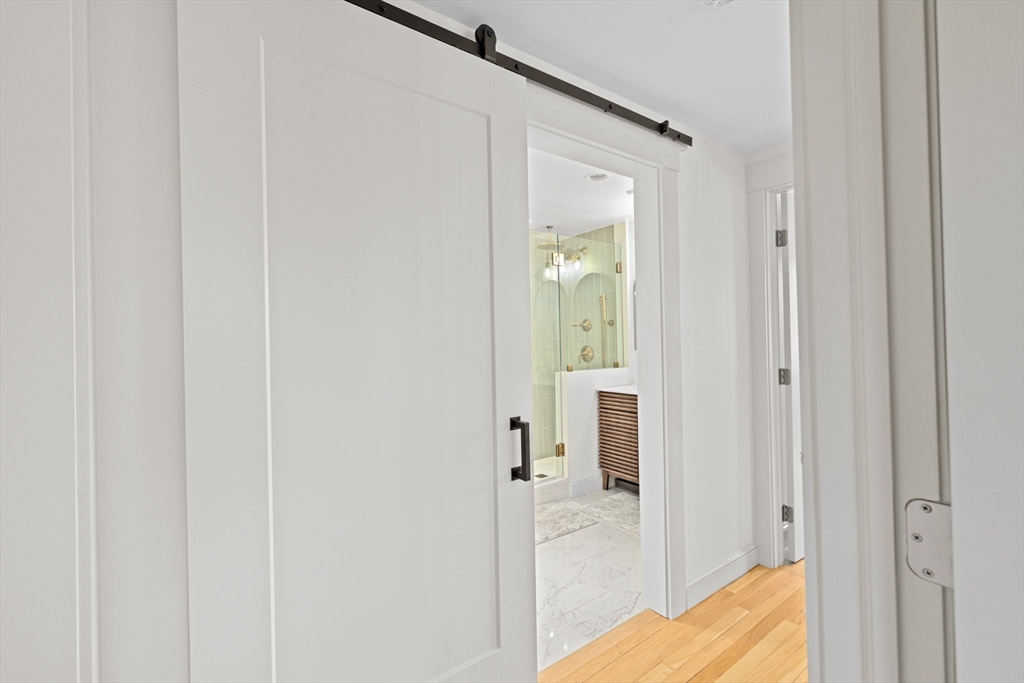 348 Main Street Norwell, MA 02061 - Photo 25 of 42 a view of a bedroom from a hallway