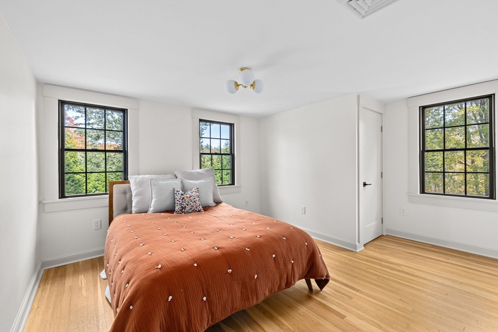 348 Main Street Norwell, MA 02061 - Photo 29 of 42 a bedroom with a large bed and a window