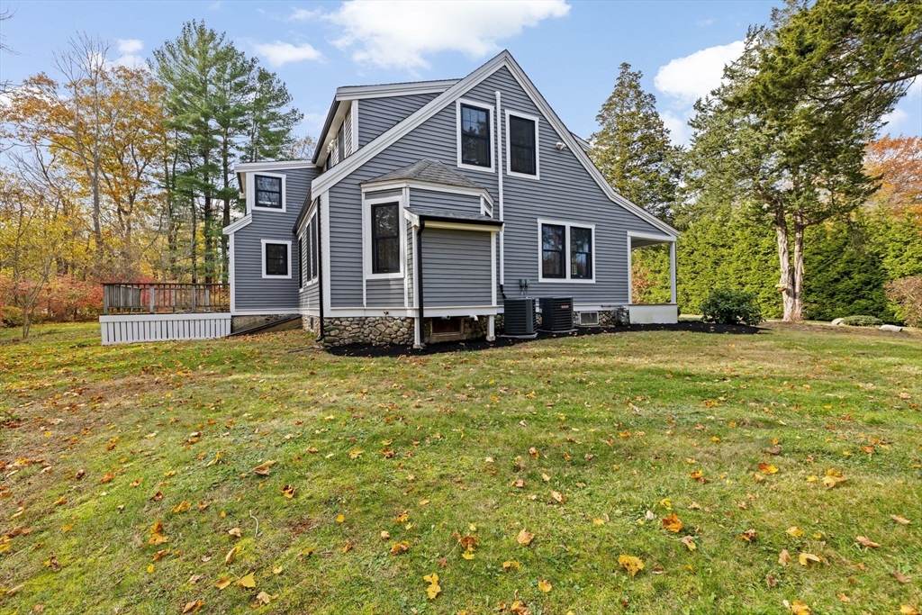 348 Main Street Norwell, MA 02061 - Photo 34 of 42 a front view of a house with a yard