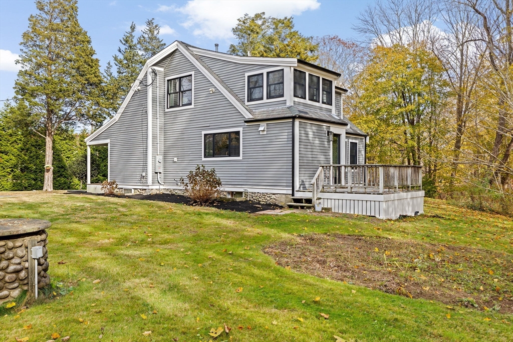 348 Main Street Norwell, MA 02061 - Photo 35 of 42 a front view of a house with a yard