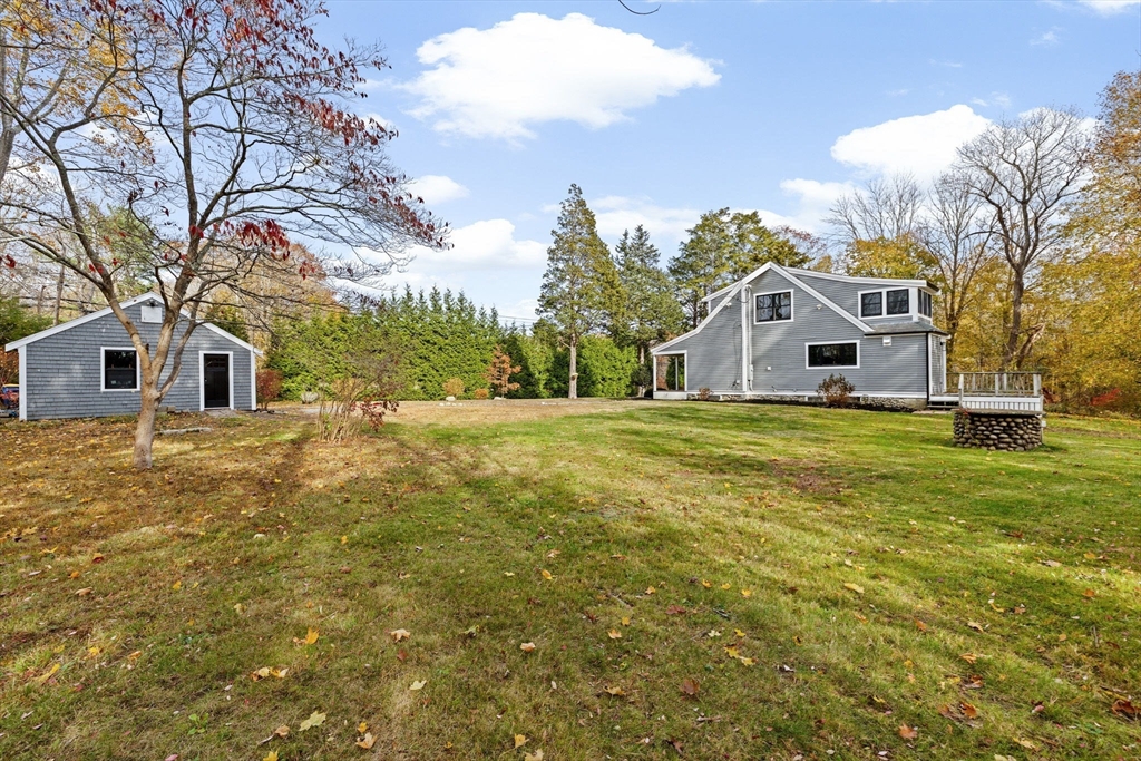 348 Main Street Norwell, MA 02061 - Photo 36 of 42 a view of a house with a yard