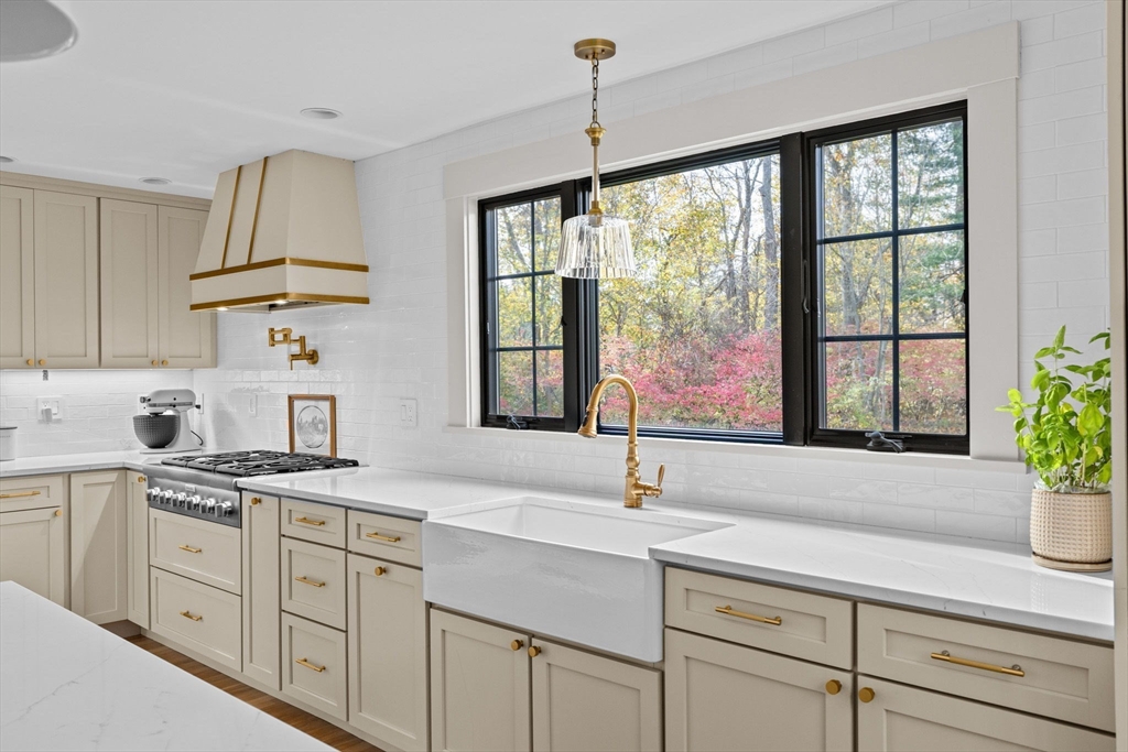 348 Main Street Norwell, MA 02061 - Photo 8 of 42 a kitchen with a sink and large window