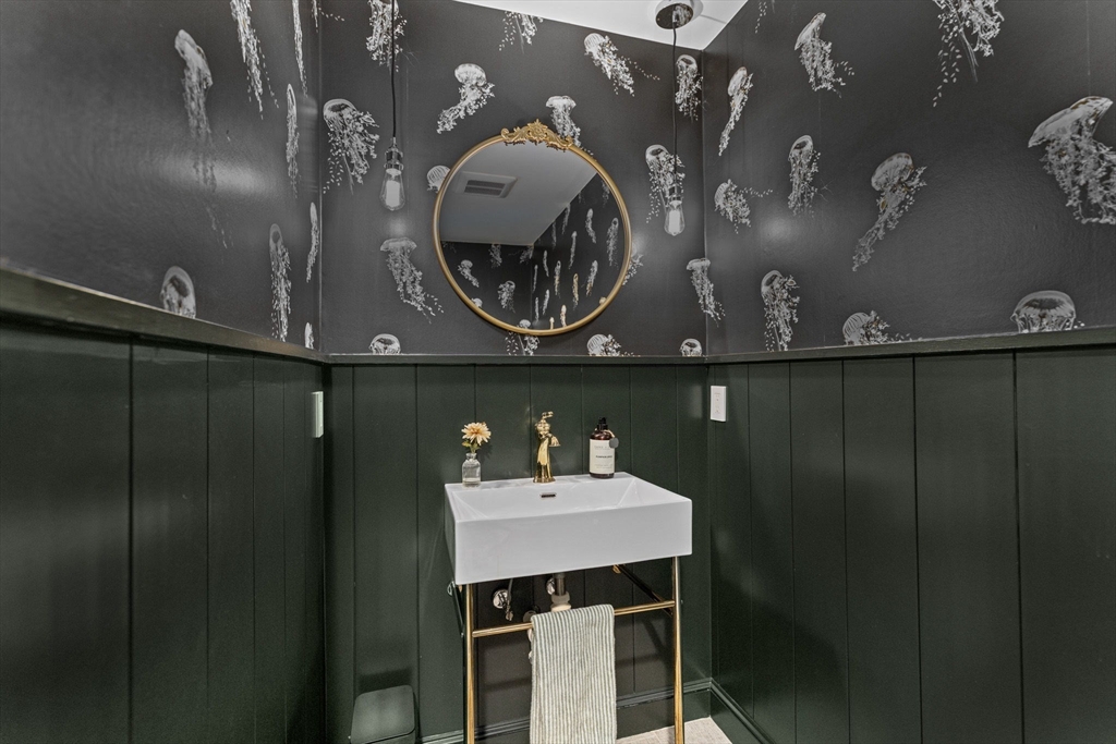 348 Main Street Norwell, MA 02061 - Photo 10 of 42 a bathroom with a sink and mirror