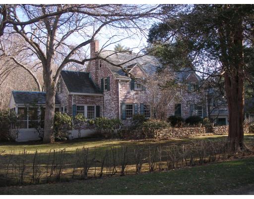 6 Lincoln Road Wellesley, MA 02481 - Photo 1 of 8 a front view of a house with a garden