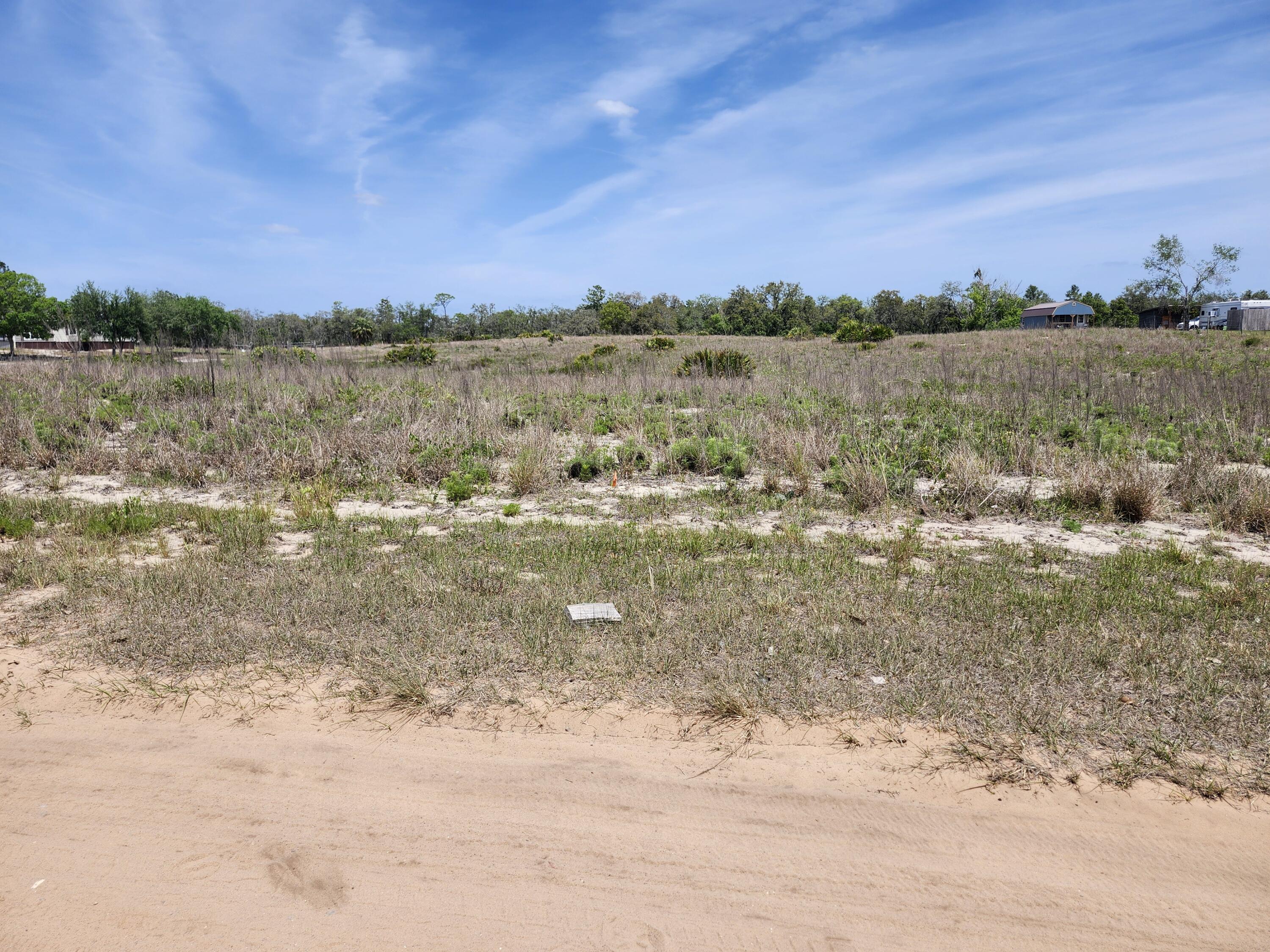 Lot 30 Fazzini Rd Lake Babson Park, FL 33827 - Photo 4 of 4 a view of a lake with a beach