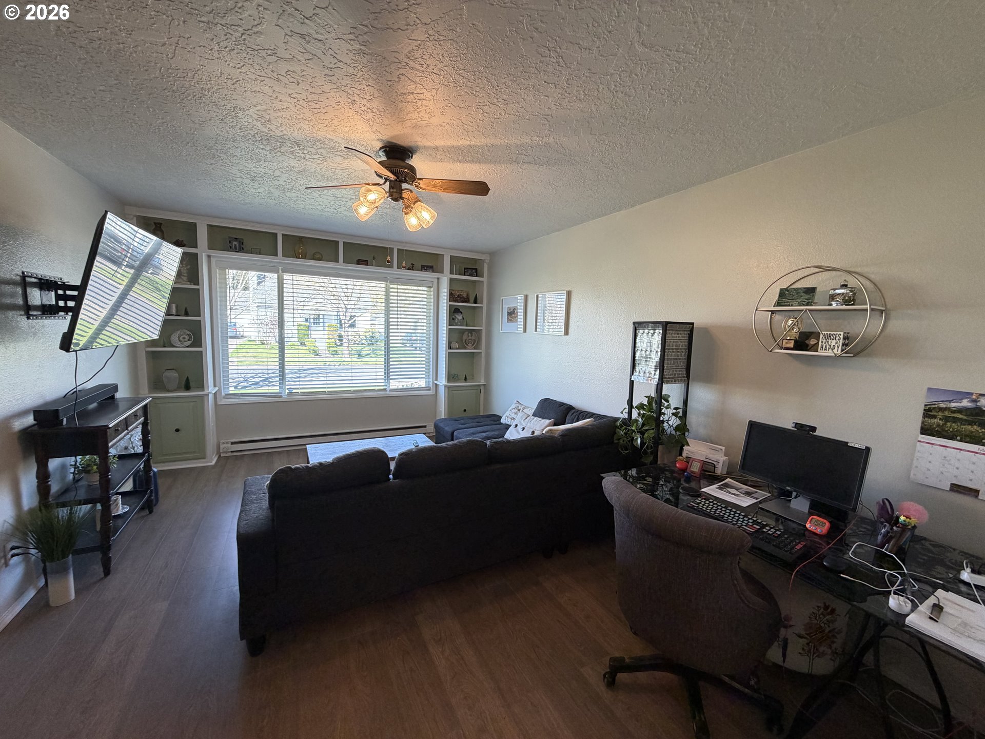 420 24th Avenue Longview, WA 98632 - Photo 3 of 21 a living room with furniture and a window