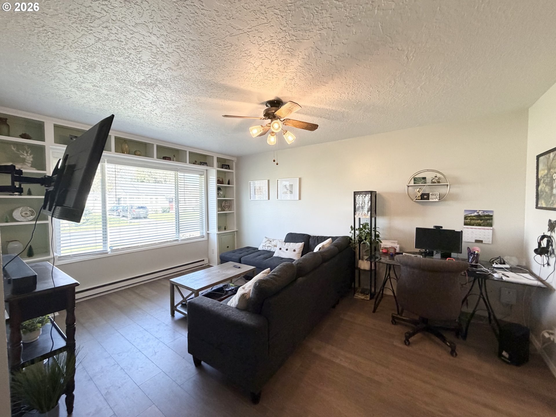 420 24th Avenue Longview, WA 98632 - Photo 4 of 21 a living room with furniture window and wooden floor