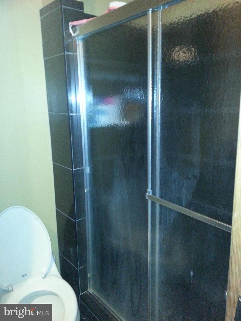 9915 Boise Road Laurel, MD 20708 - Photo 9 of 17 Ceramic in shower enclosure