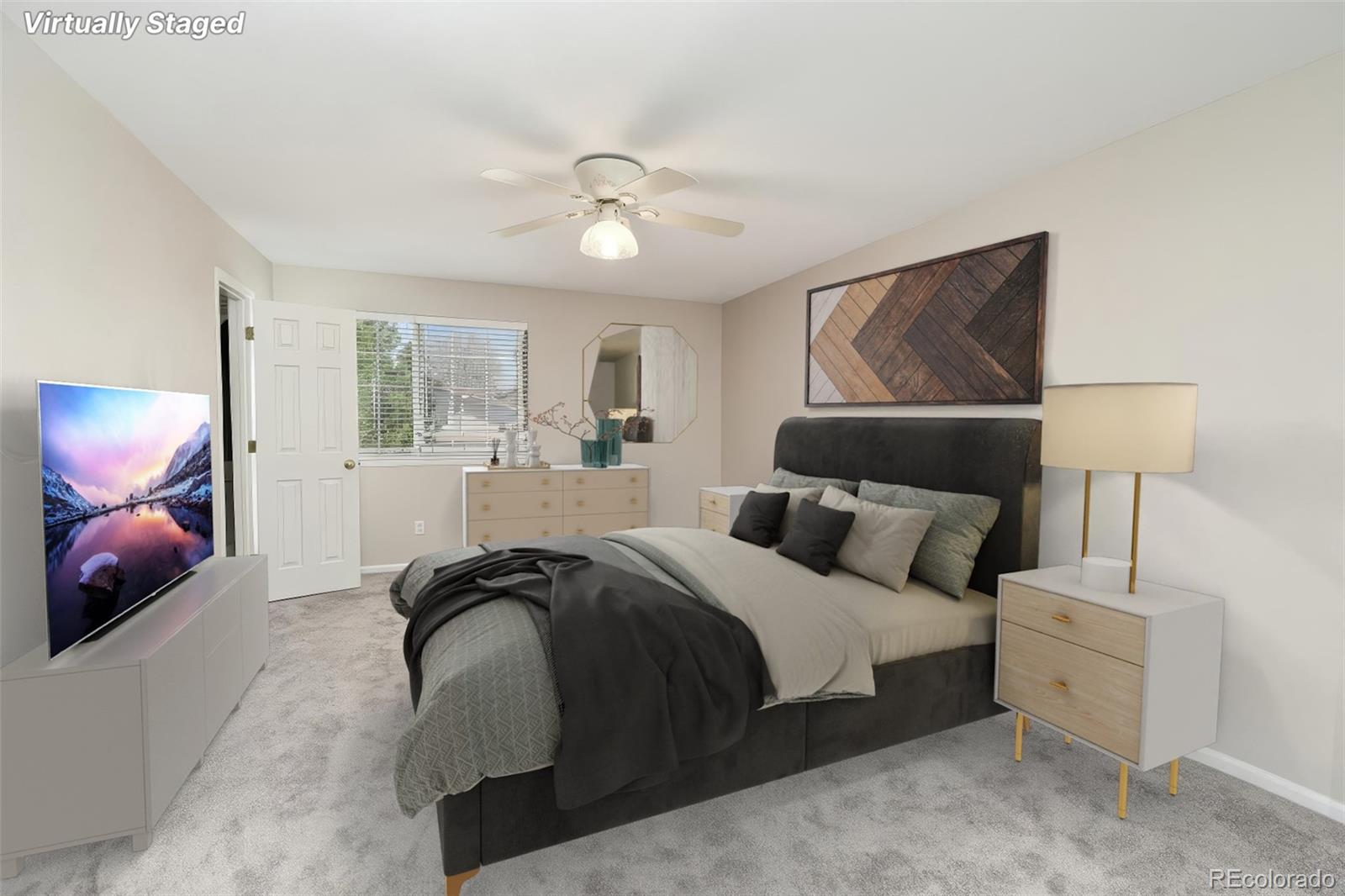 9265 Roadrunner Street Highlands Ranch, CO 80129 - Photo 15 of 28 a bedroom with a bed and wooden floor