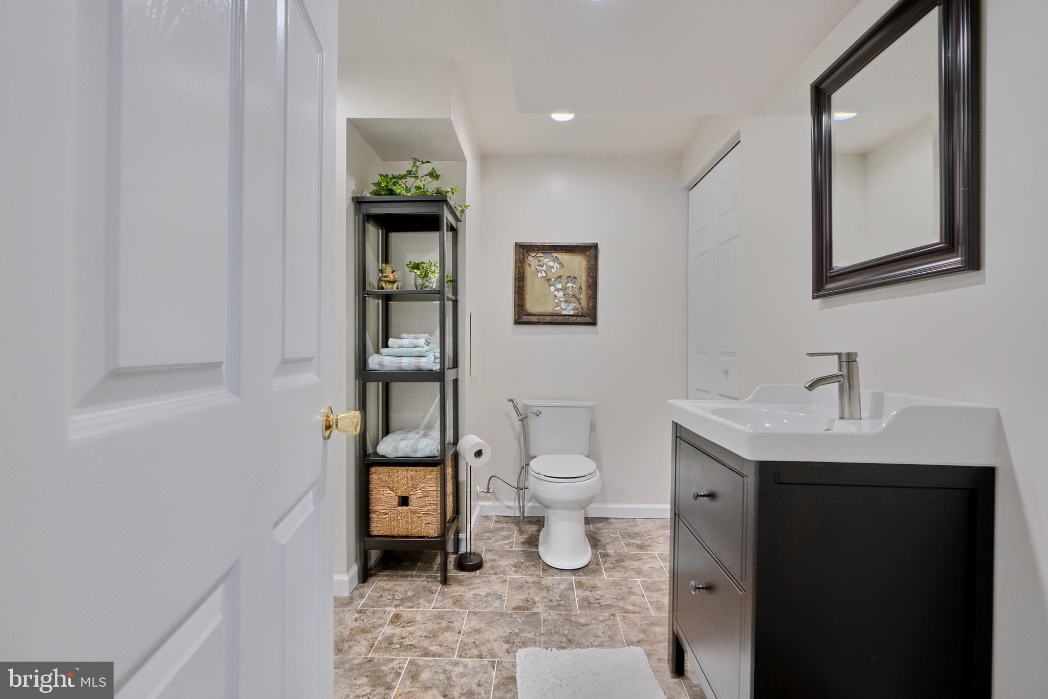 9330 Beowulf Circle Rosedale, MD 21237 - Photo 14 of 39 Full bath off of the family room