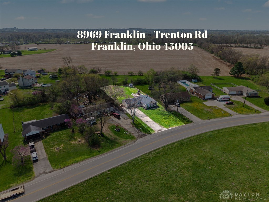 8969 Franklin-Trenton Road Franklin, OH 45005 - Photo 13 of 49 An inviting property with a charming home and abundant outdoor space, ideal for peaceful country living.