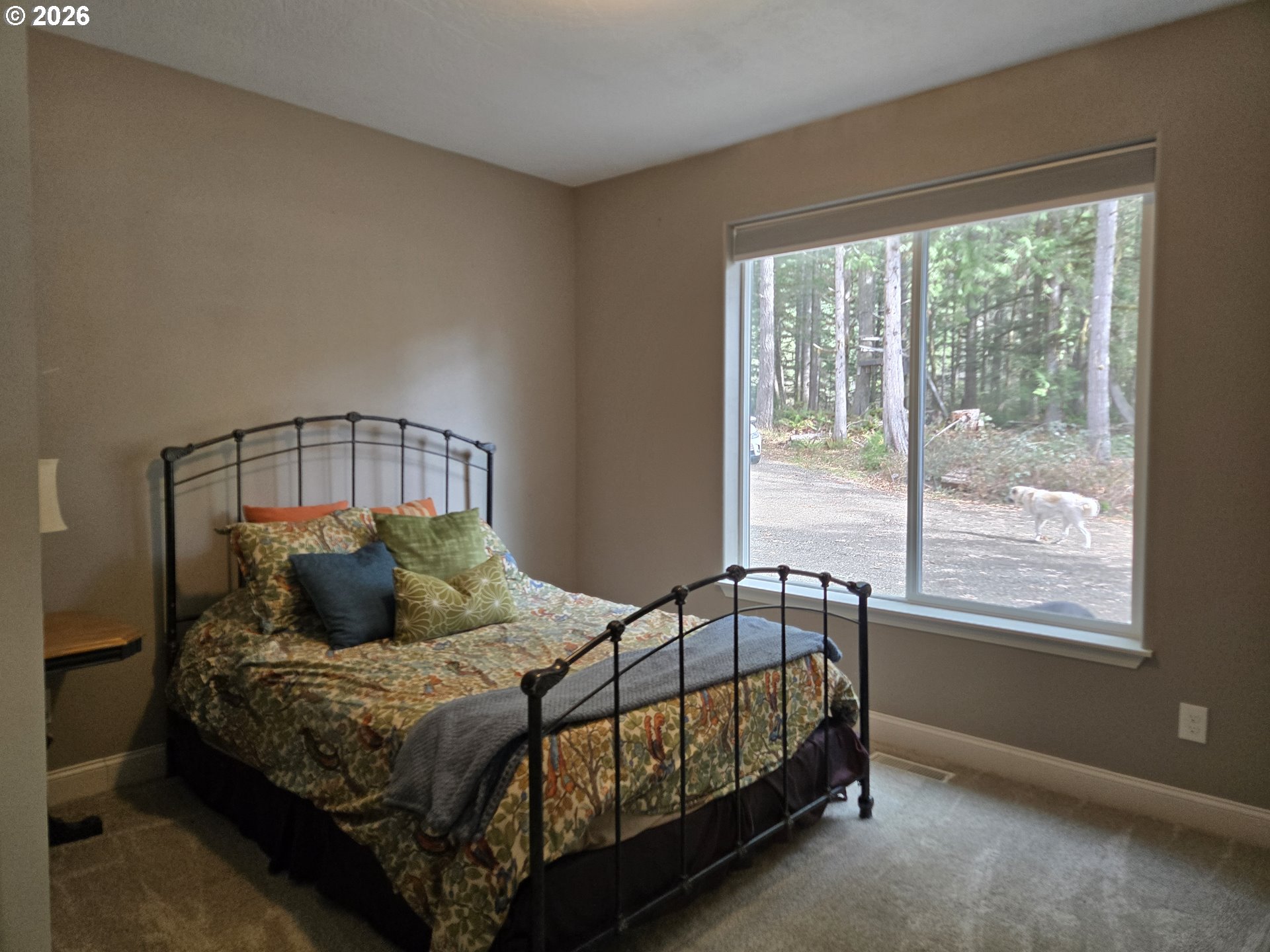 16817 Nonpareil Road Sutherlin, OR 97479 - Photo 14 of 39 a bedroom with a bed and window
