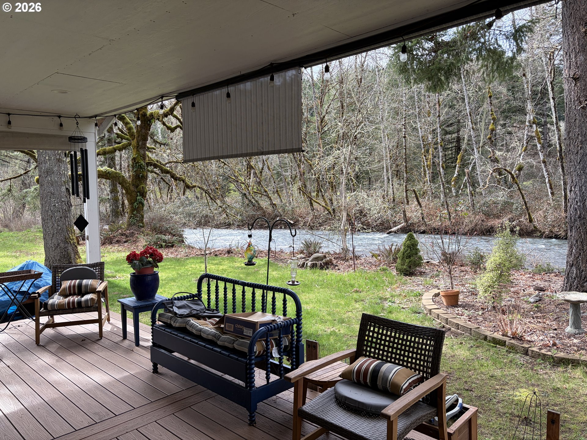 16817 Nonpareil Road Sutherlin, OR 97479 - Photo 22 of 39 a view of a chair and tables in the back yard of the house