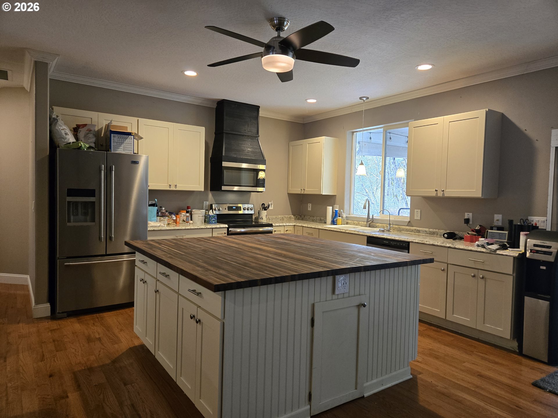 16817 Nonpareil Road Sutherlin, OR 97479 - Photo 8 of 39 a kitchen with stainless steel appliances granite countertop a sink stove and refrigerator