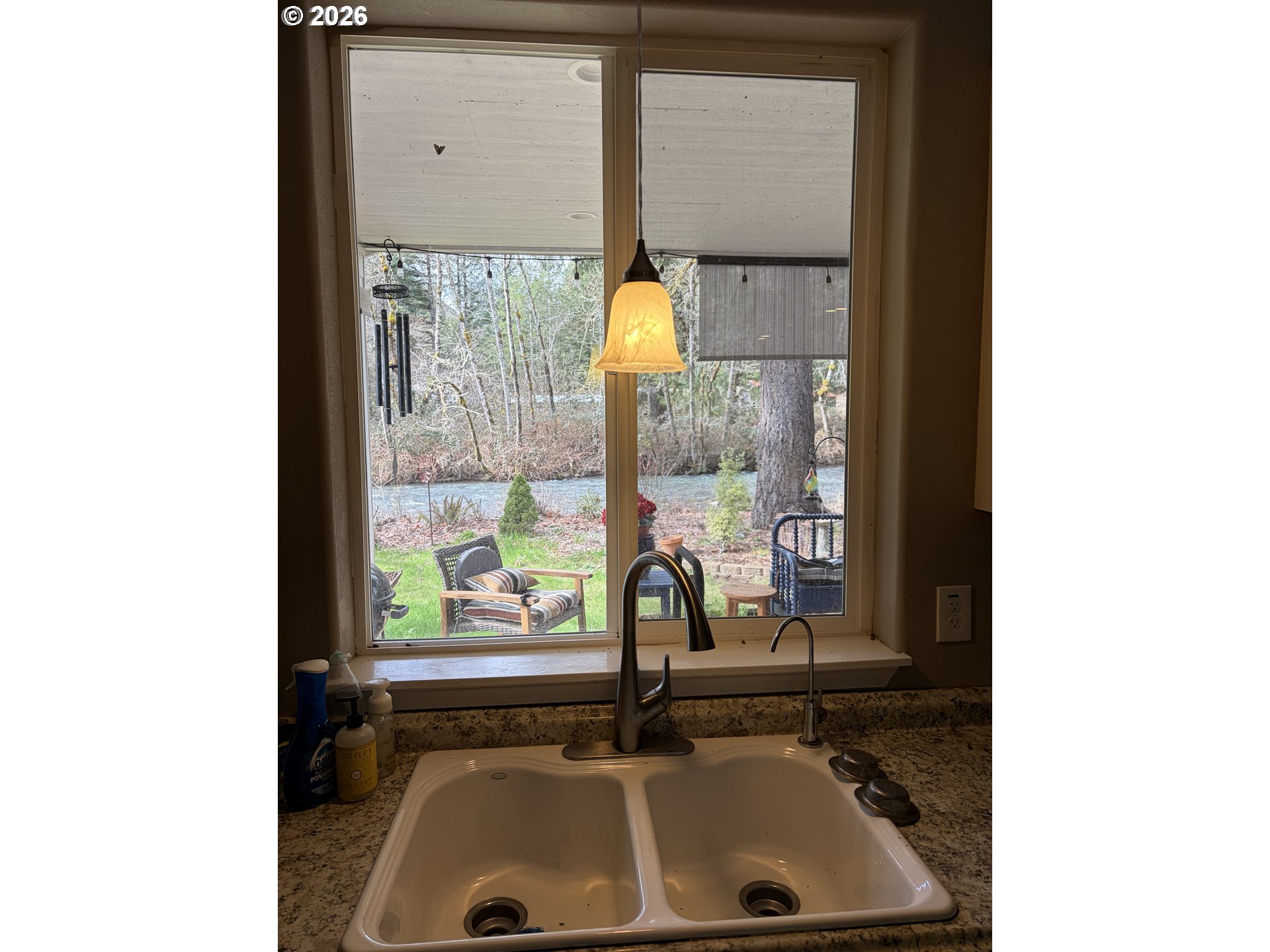 16817 Nonpareil Road Sutherlin, OR 97479 - Photo 9 of 39 a bathroom with a sink and a window