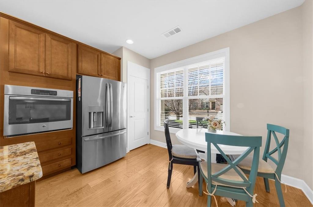 3739 Golden Leaf Point Southwest Gainesville, GA 30504 - Photo 20 of 60 a dining room with furniture and window