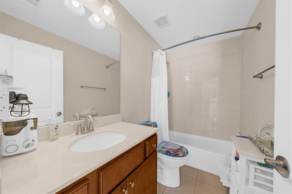 3739 Golden Leaf Point Southwest Gainesville, GA 30504 - Photo 30 of 60 a bathroom with a sink and a mirror