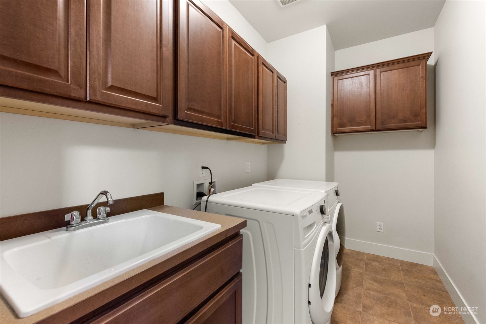 22201 32nd Avenue Southeast Bothell, WA 98021 - Photo 22 of 39 a utility room with sink dryer and washer
