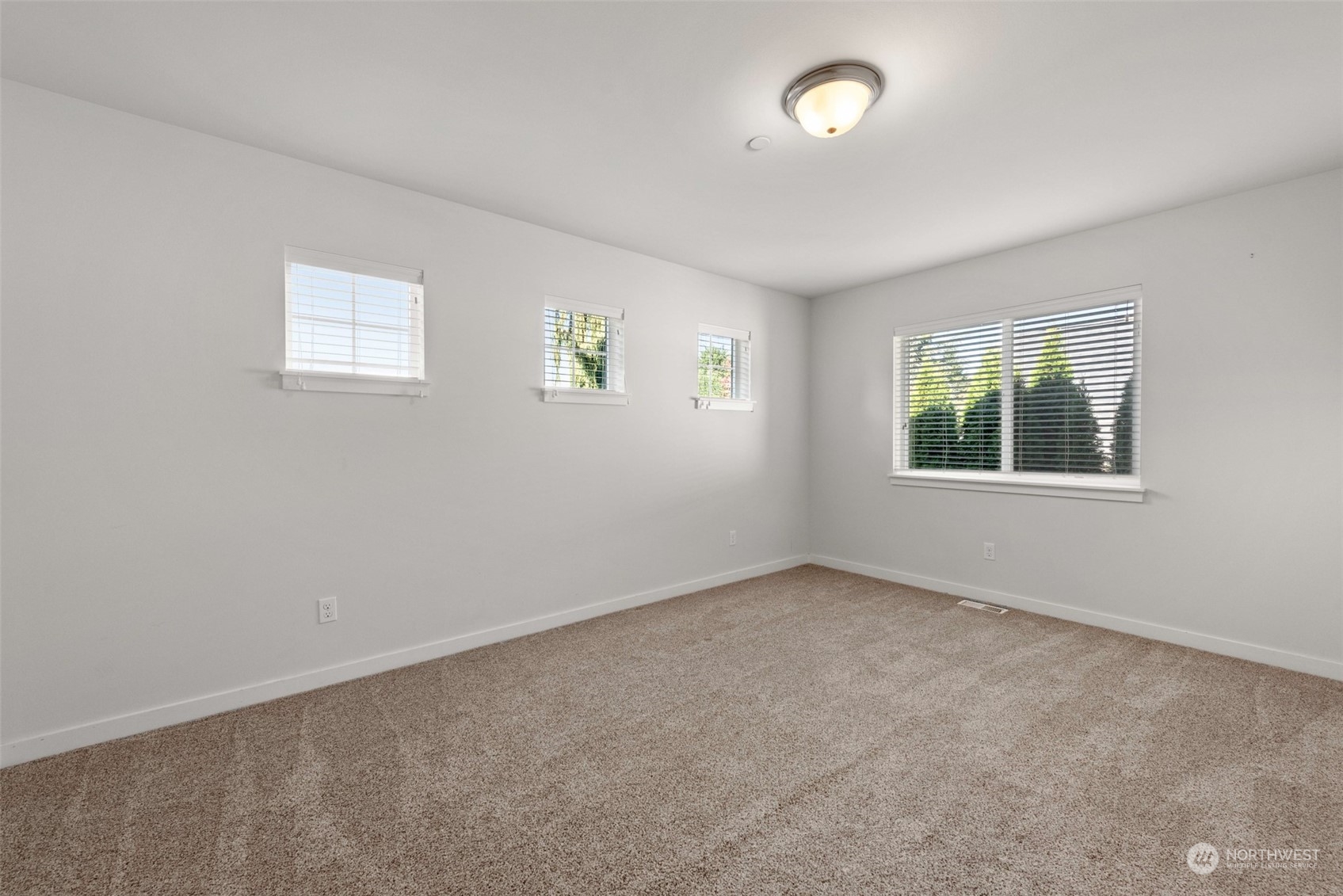 22201 32nd Avenue Southeast Bothell, WA 98021 - Photo 28 of 39 an empty room with windows