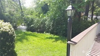 a view of a garden from a balcony