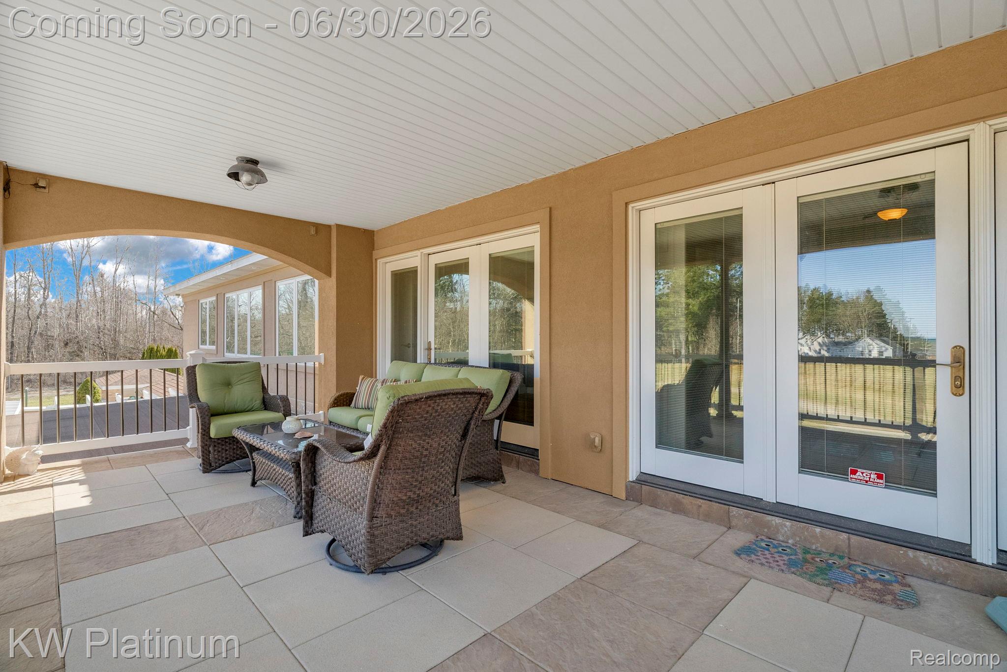 2235 South Lake Shore Road Harbor Beach, MI 48441 - Photo 38 of 99 Covered patio featuring mixed-tone rectangular paver flooring
