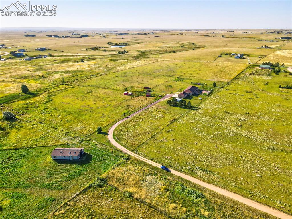 3805 Curtis Road Peyton, CO 80831 - Photo 34 of 36 a view of an ocean and a building