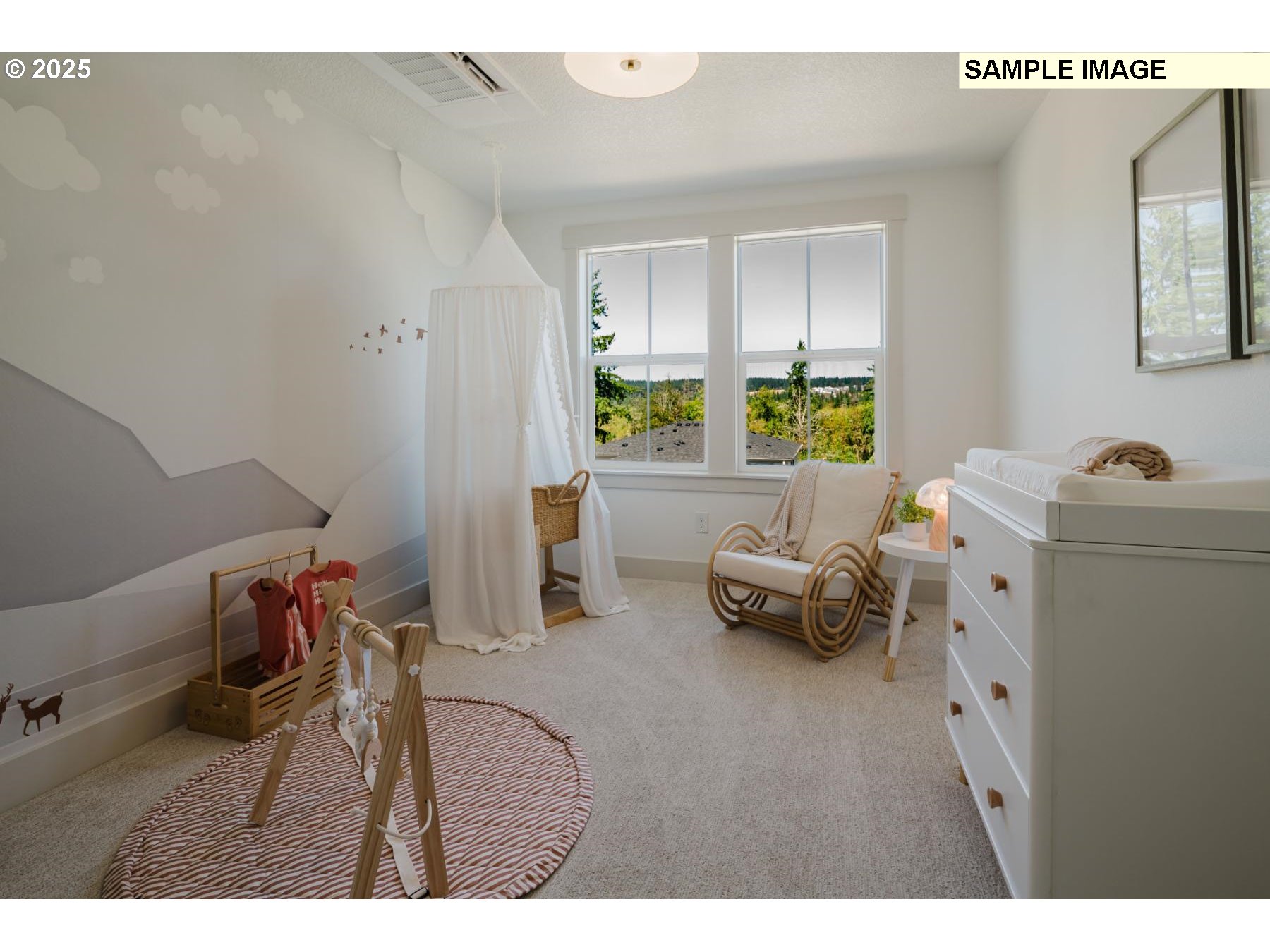 4719 Northwest Camas Meadows Drive Camas, WA 98607 - Photo 17 of 29 a bedroom with furniture and a bed