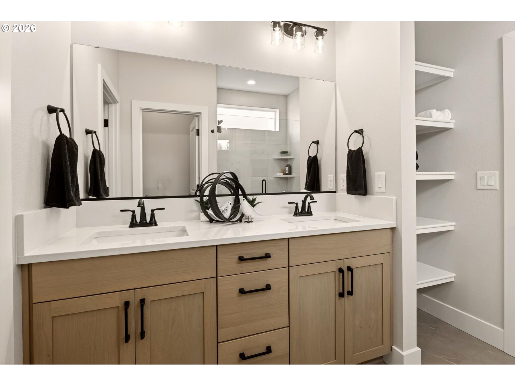 4719 Northwest Camas Meadows Drive Camas, WA 98607 - Photo 21 of 29 a bathroom with a double vanity sink and a mirror
