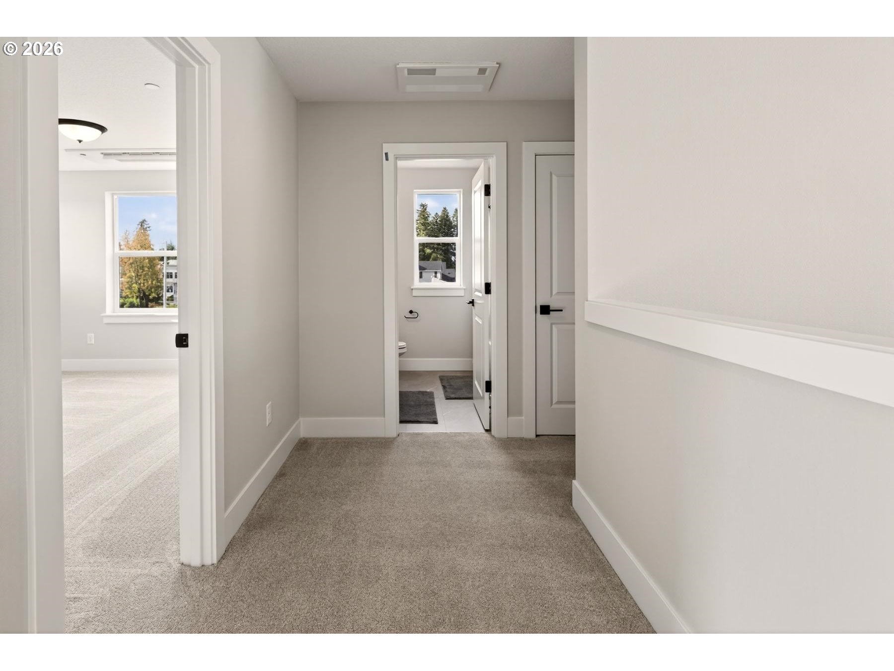 4719 Northwest Camas Meadows Drive Camas, WA 98607 - Photo 28 of 29 hallway with wooden floor and windows