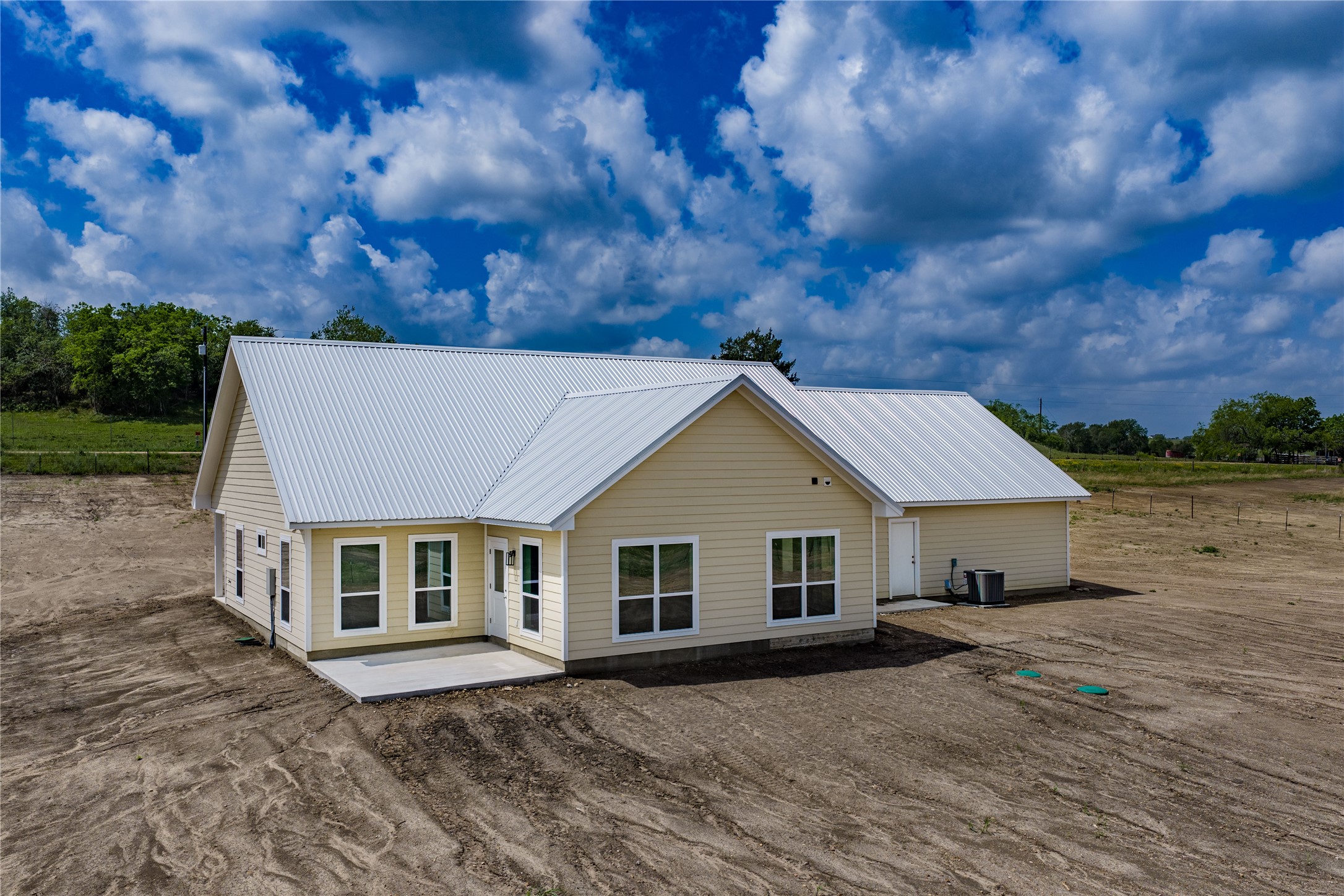 9345 Hajovsky Road La Grange, TX 78945 - Photo 14 of 24 a front view of a house with a yard