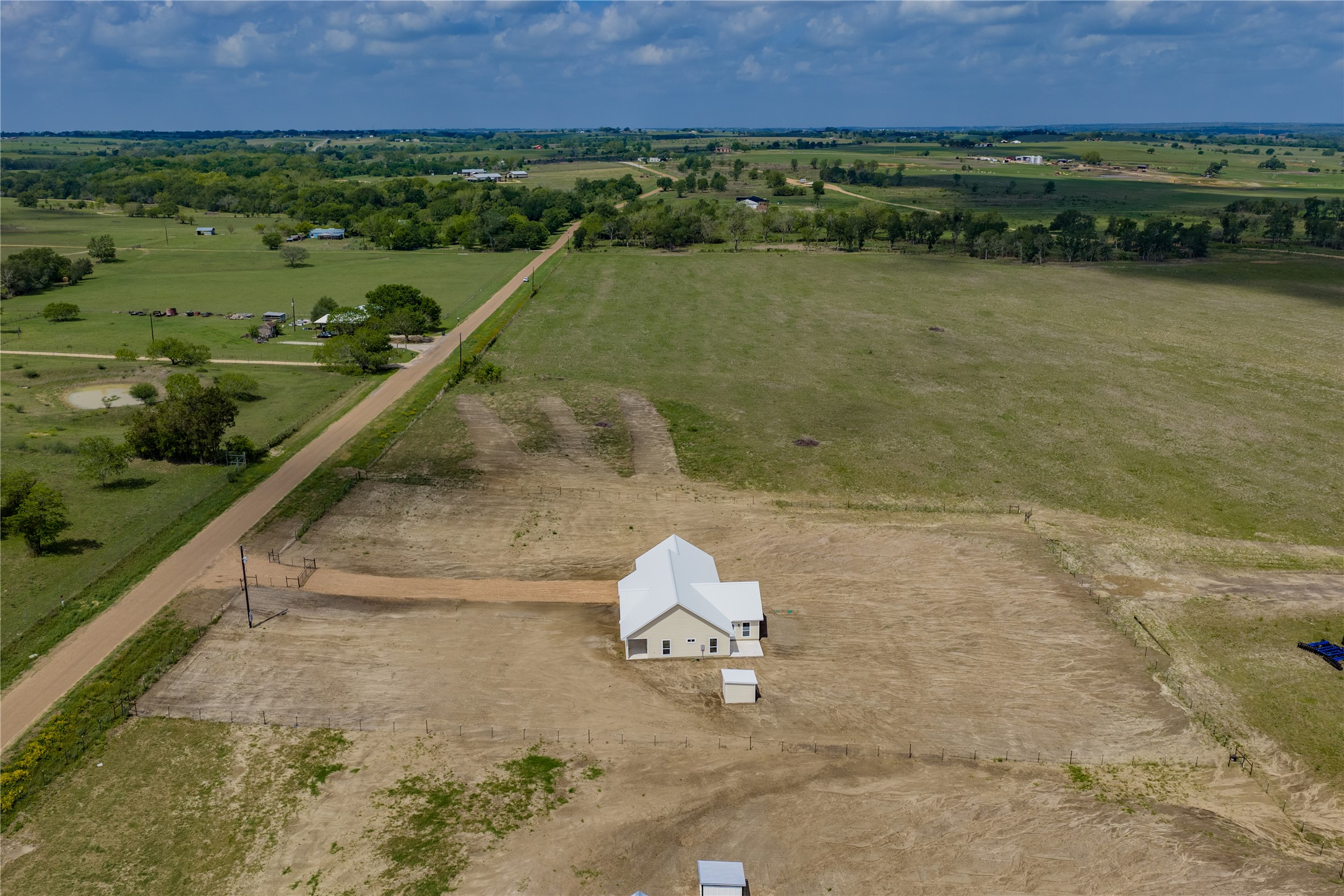 9345 Hajovsky Road La Grange, TX 78945 - Photo 16 of 24 a view of a lake with a yard