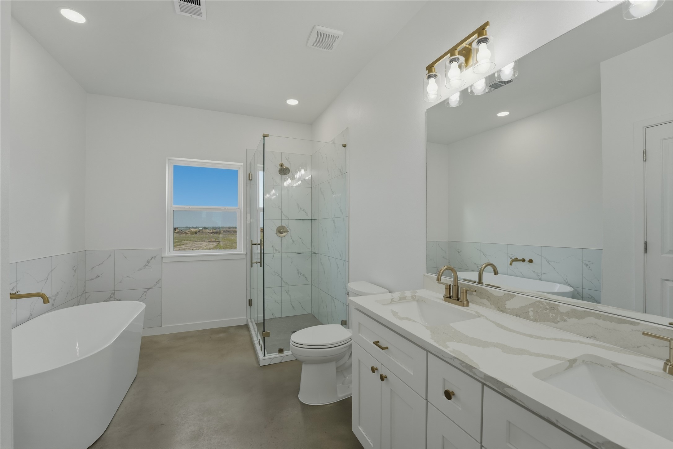 9345 Hajovsky Road La Grange, TX 78945 - Photo 5 of 24 a bathroom with a sink a toilet and shower