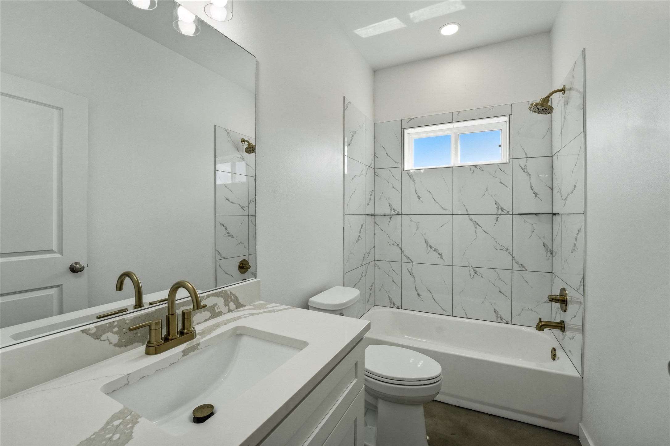 9345 Hajovsky Road La Grange, TX 78945 - Photo 8 of 24 a bathroom with a sink a toilet and shower