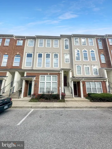 a front view of a building with a street