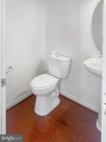 a bathroom with a toilet and a sink
