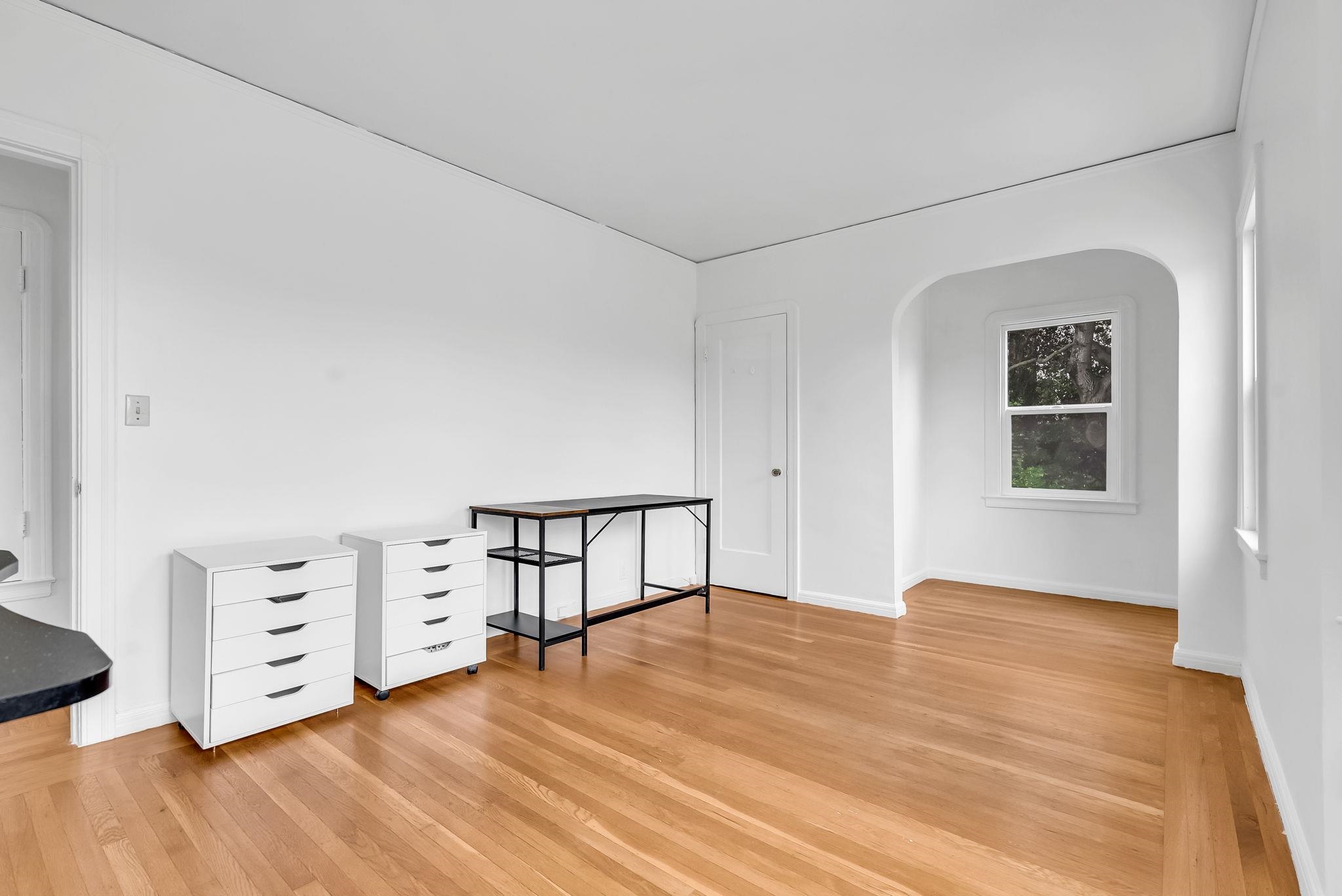 2340 Virginia Street Berkeley, CA 94709 - Photo 35 of 60 a view of an empty room with wooden floor