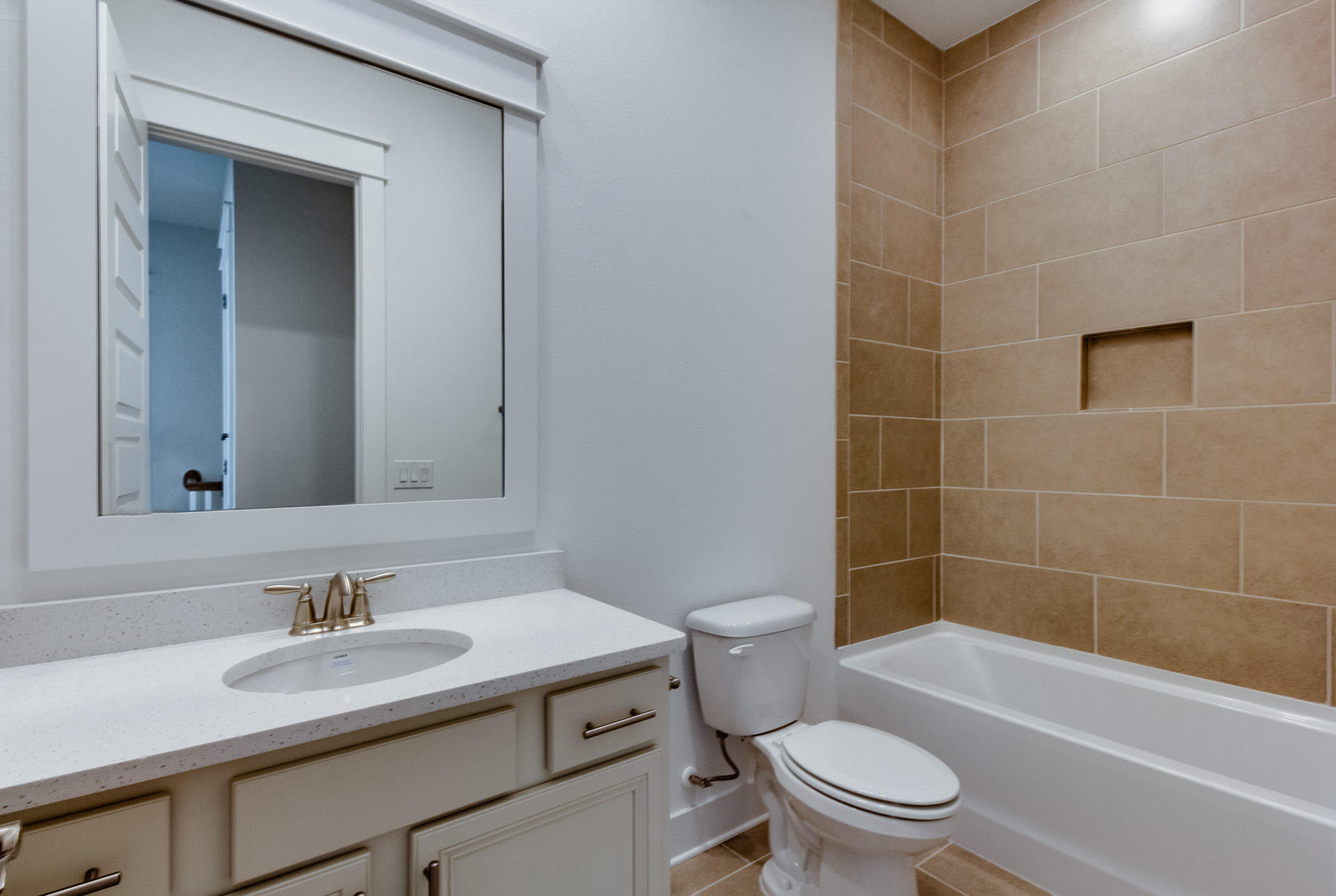 38 Pine Lands Loop East, Unit 447B Inlet Beach, FL 32461 - Photo 15 of 32 a bathroom with a sink a toilet and shower