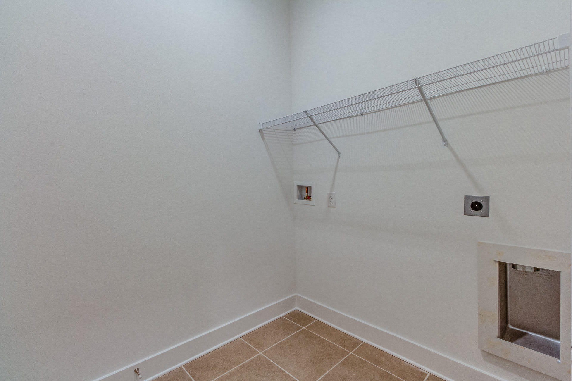 38 Pine Lands Loop East, Unit 447B Inlet Beach, FL 32461 - Photo 23 of 32 a view of a room with racks on the wall