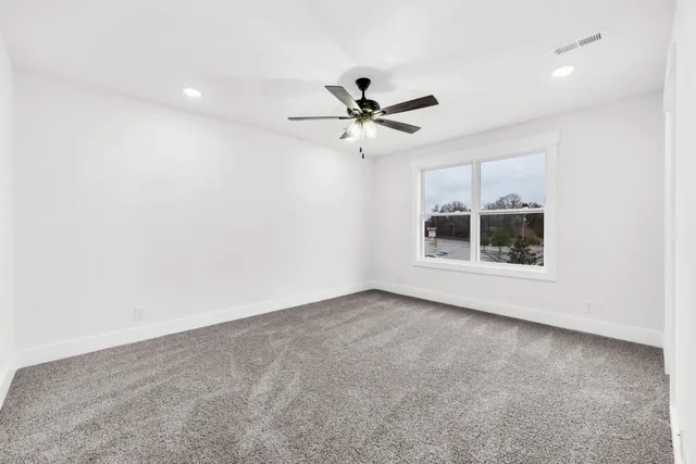 a view of a room with racks on the wall