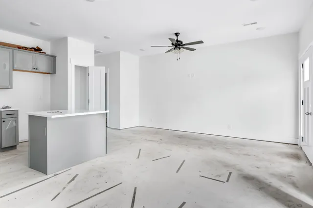 a view of a kitchen with a sink