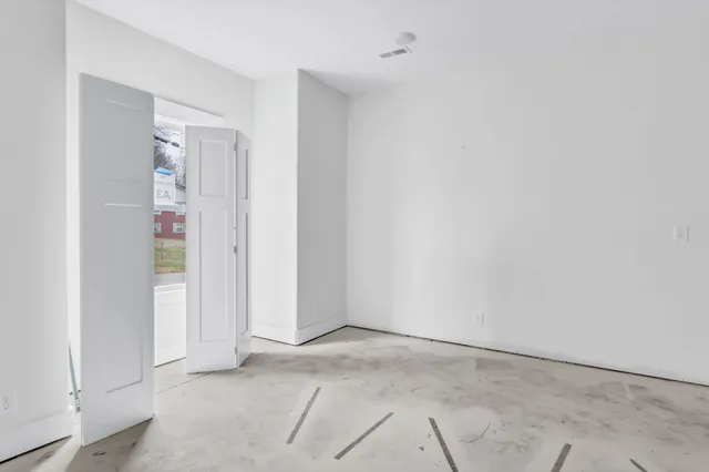 an empty room with closet