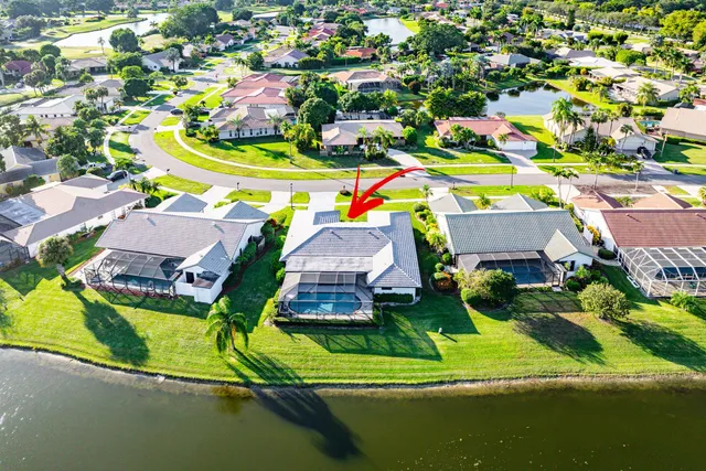 a view of houses with swimming pool and outdoor space