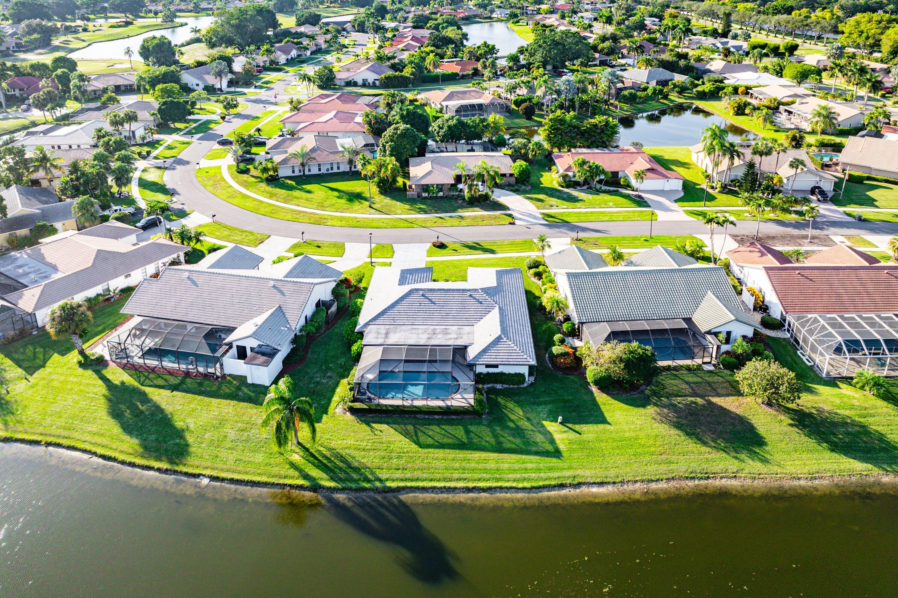 10174 Crosswind Road Boca Raton, FL 33498 - Photo 40 of 45 an aerial view of a house with a swimming pool yard and outdoor seating