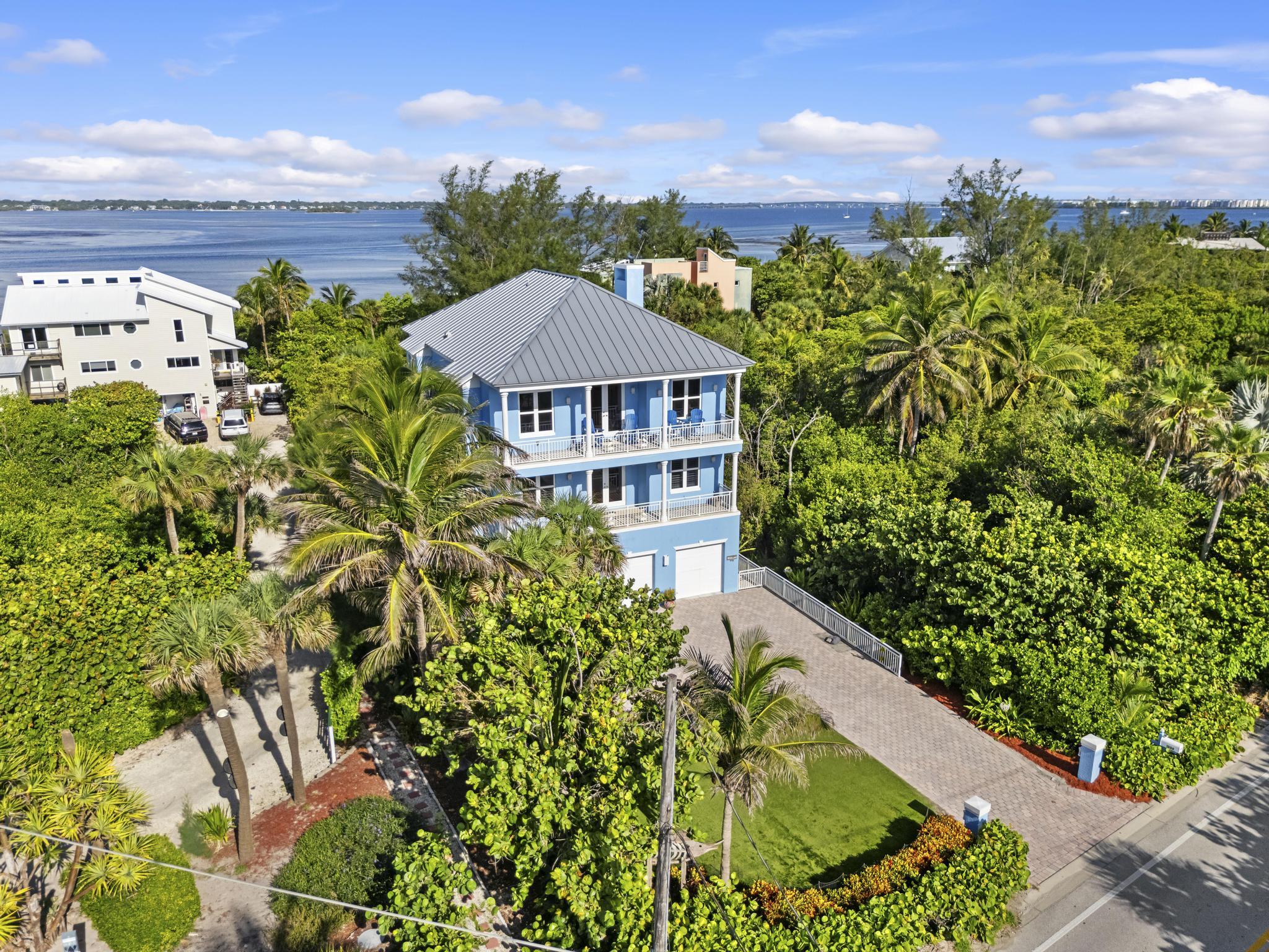 1334 Southeast MacArthur Boulevard Stuart, FL 34996 - Photo 3 of 71 DJI_20250718092034_0062_D