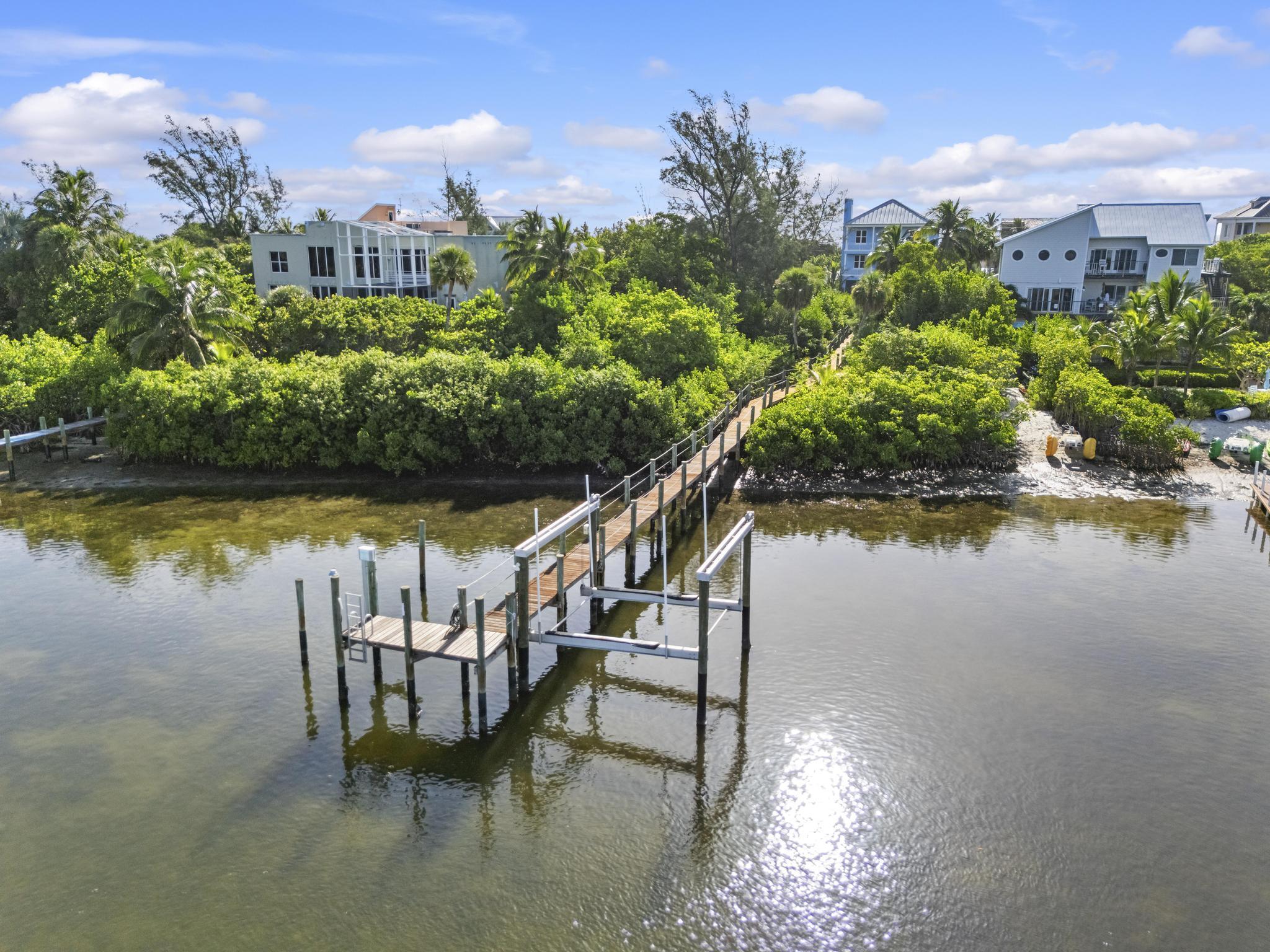 1334 Southeast MacArthur Boulevard Stuart, FL 34996 - Photo 56 of 71 DJI_20250718091842_0049_D