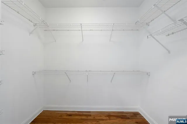 a view of a room with racks on the wall